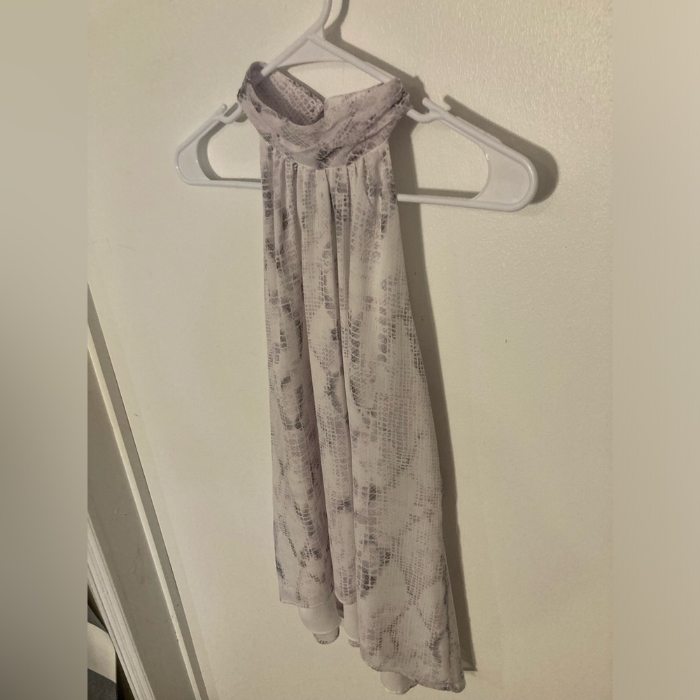 White House Black Market halter top in size small in plains snake ecru color